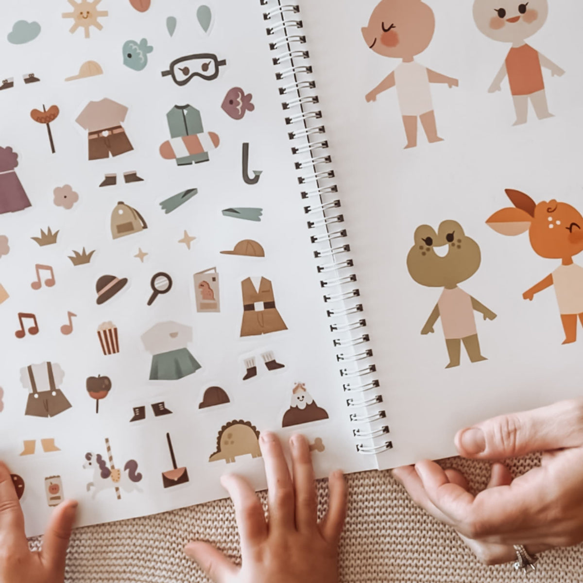 Cupkin sticker books, coloring books, cups, and family products