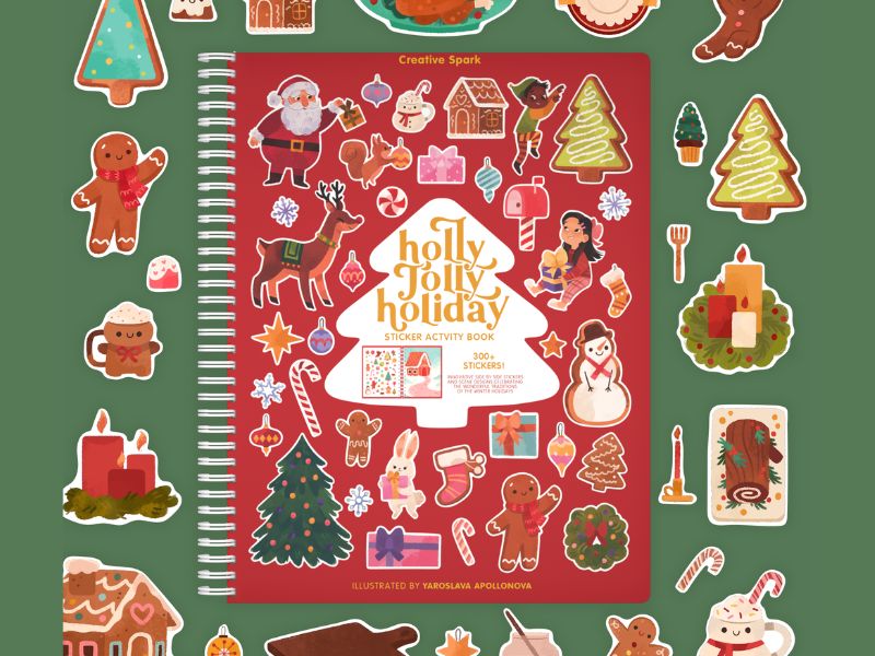 A spiral-bound 'Holly, Jolly, Holiday' gingerbread activity book by Creative Spark, surrounded by matching gingerbread-themed sticker illustrations on a dark green background.